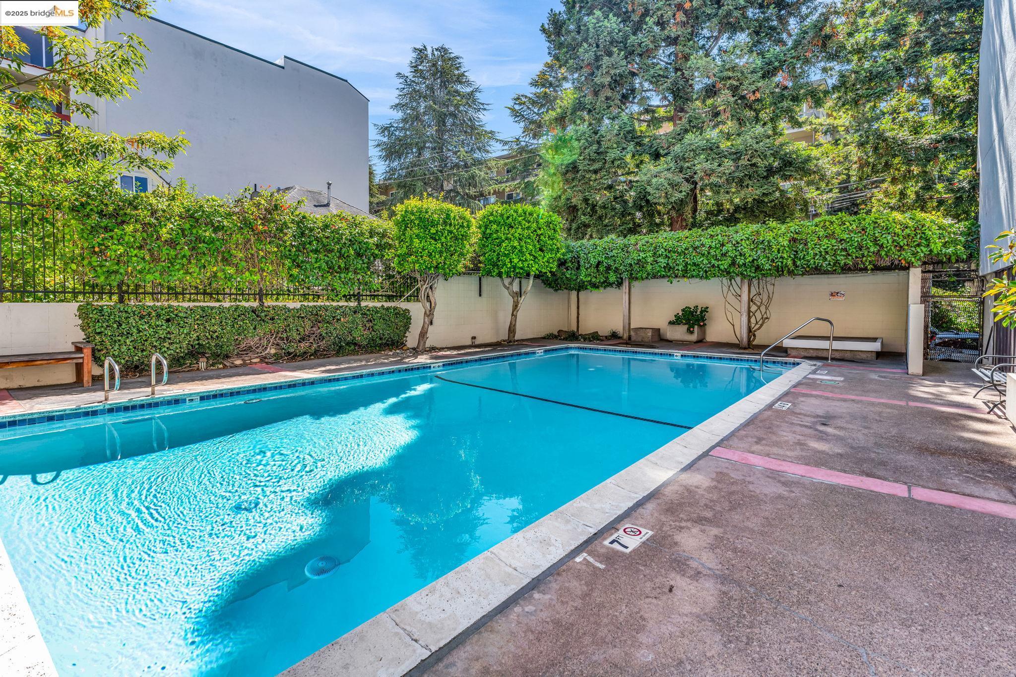 288 Whitmore Street, Unit 220 Oakland, CA 94611 - Photo 7 of 38 Community pool with a patio