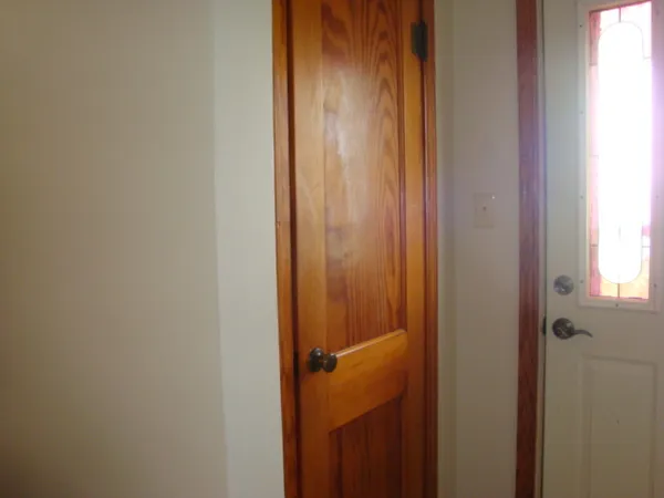 a bathroom with a glass door