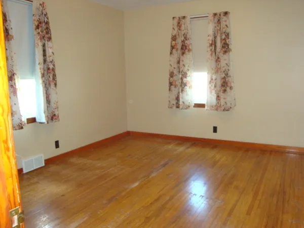 a view of a room that has a window