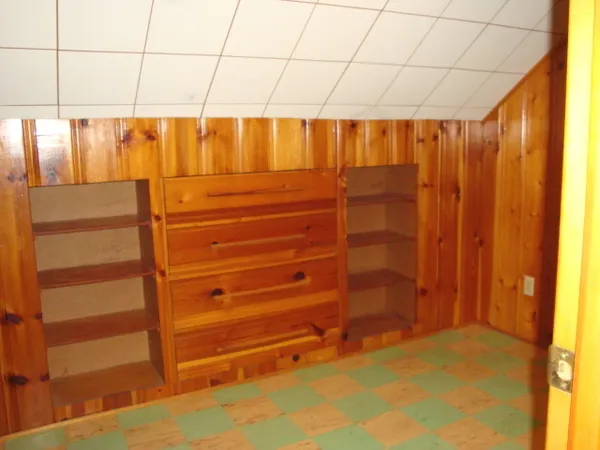 a view of a bathroom with shower curtain