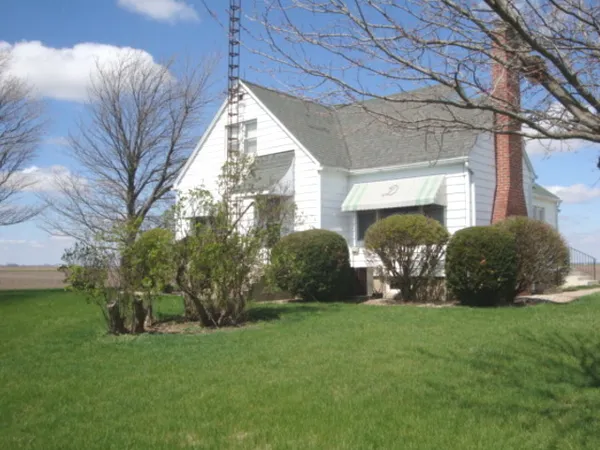 a view of a backyard of the house
