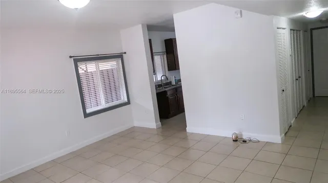 a bathroom with a toilet a sink and shower