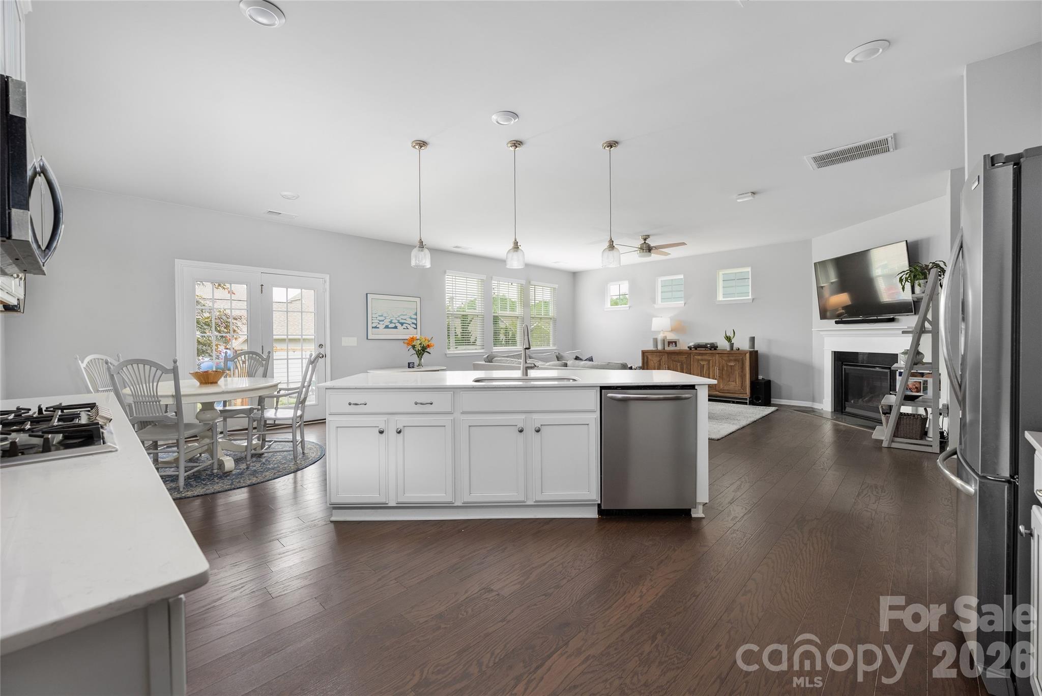 17219 Shearer Road Davidson, NC 28036 - Photo 6 of 34 a kitchen with sink and stove top oven
