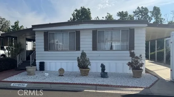 a house view with a outdoor space