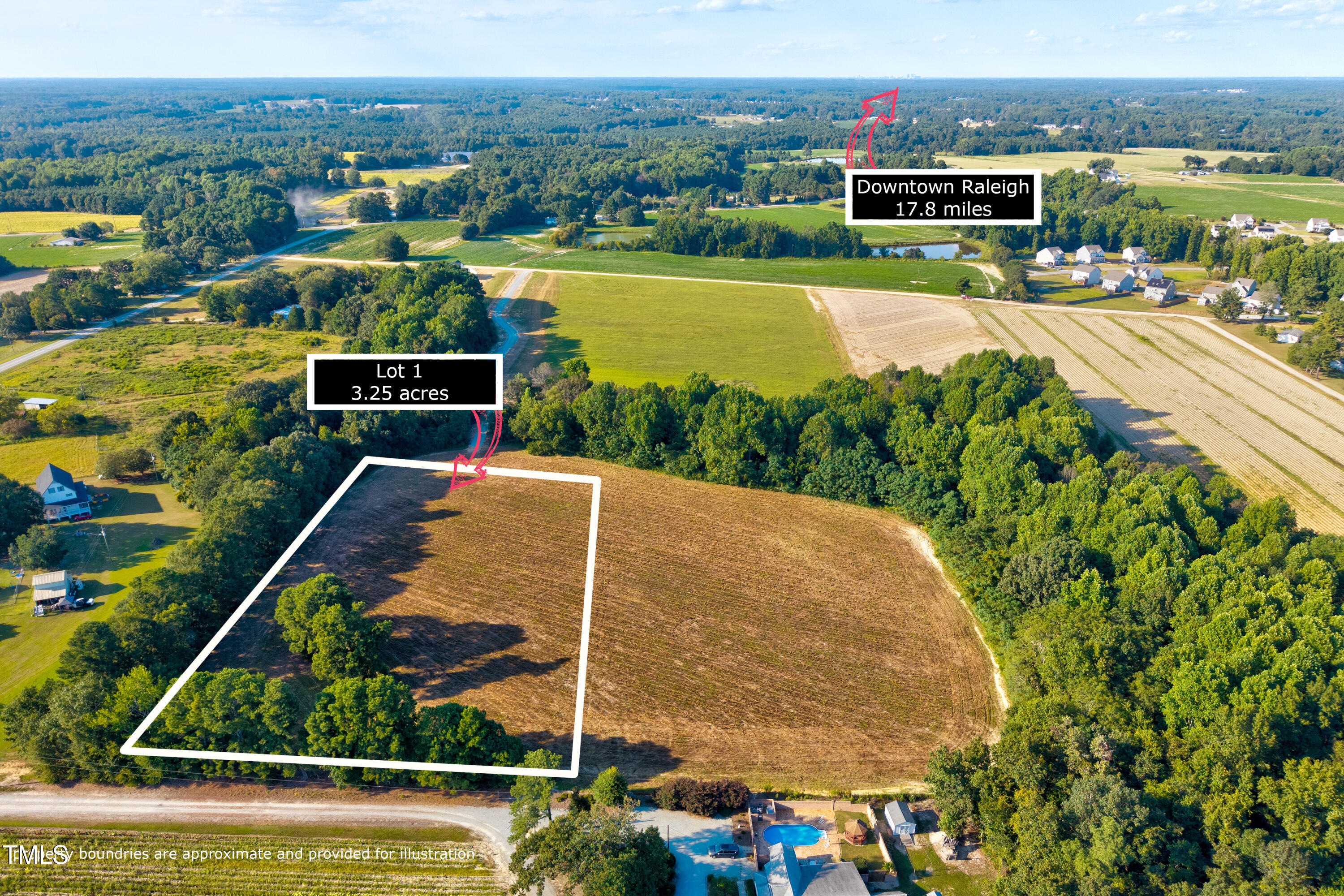 1 Mockingbird Lane Willow Spring, NC 27592 - Photo 2 of 8 a view of a balcony with lake view