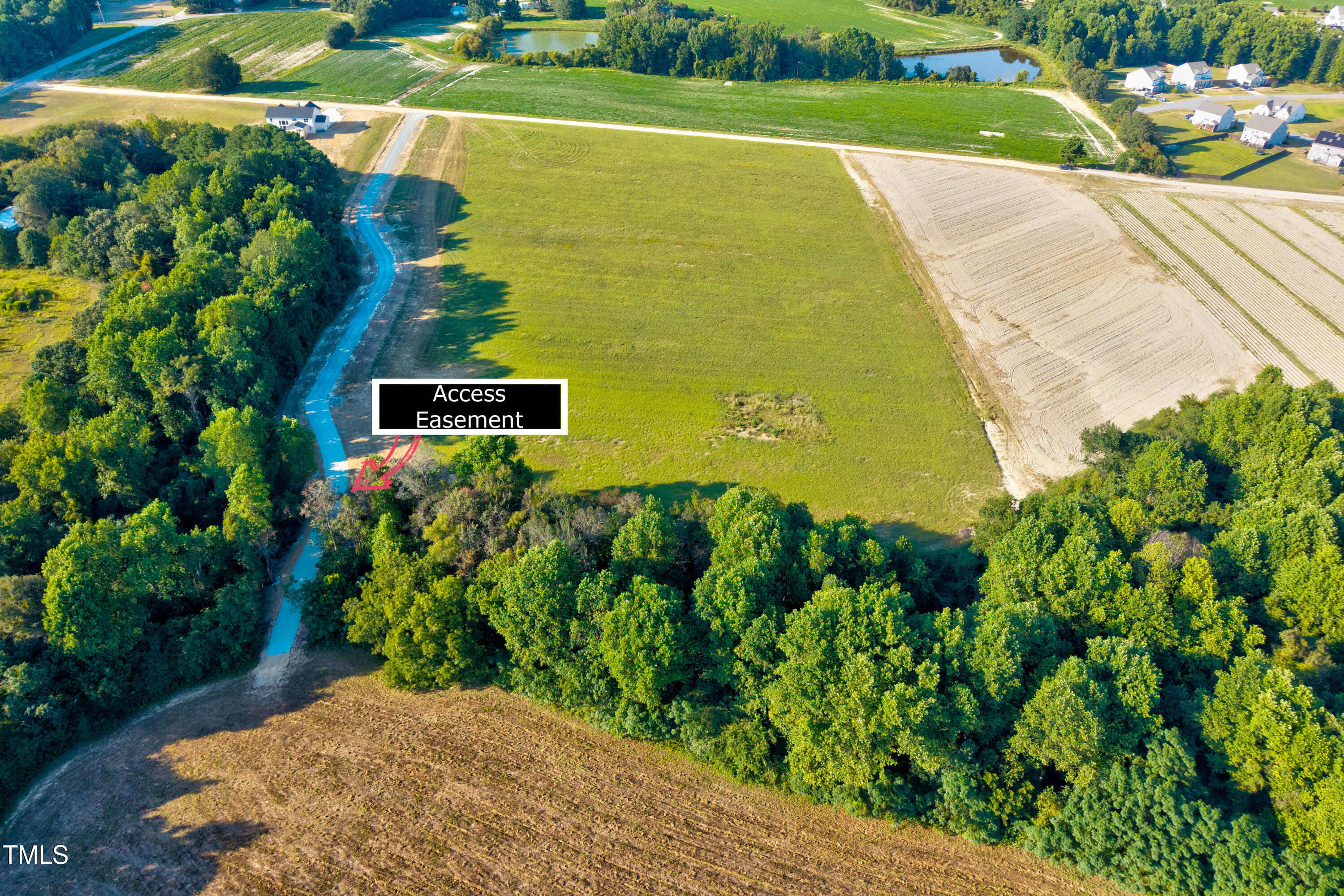 1 Mockingbird Lane Willow Spring, NC 27592 - Photo 7 of 8 a view of a back yard