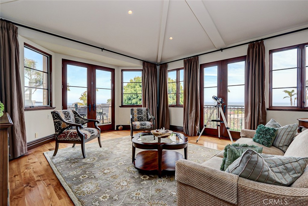 853 6th Street Manhattan Beach, CA 90266 - Photo 14 of 60 a living room with furniture and floor to ceiling windows