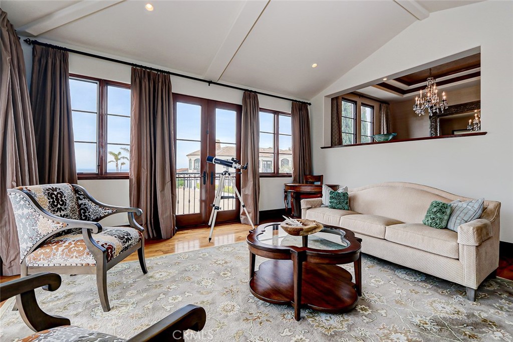 853 6th Street Manhattan Beach, CA 90266 - Photo 16 of 60 a living room with furniture and floor to ceiling windows