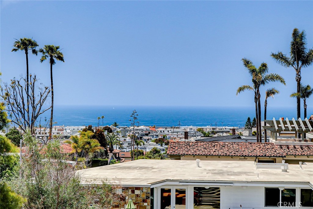 853 6th Street Manhattan Beach, CA 90266 - Photo 20 of 60 a view of a yard with an ocean view