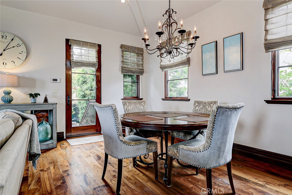 853 6th Street Manhattan Beach, CA 90266 - Photo 23 of 60 a view of a dining room with furniture window and wooden floor