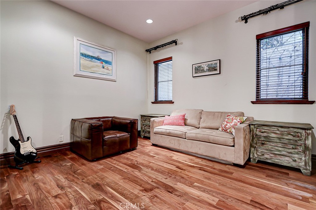 853 6th Street Manhattan Beach, CA 90266 - Photo 42 of 60 a living room with furniture and a window