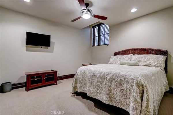 a kitchen with a sink appliances and cabinets