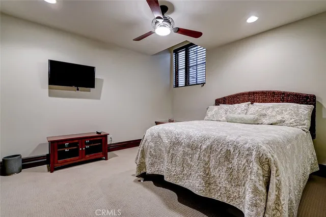 a kitchen with a sink appliances and cabinets