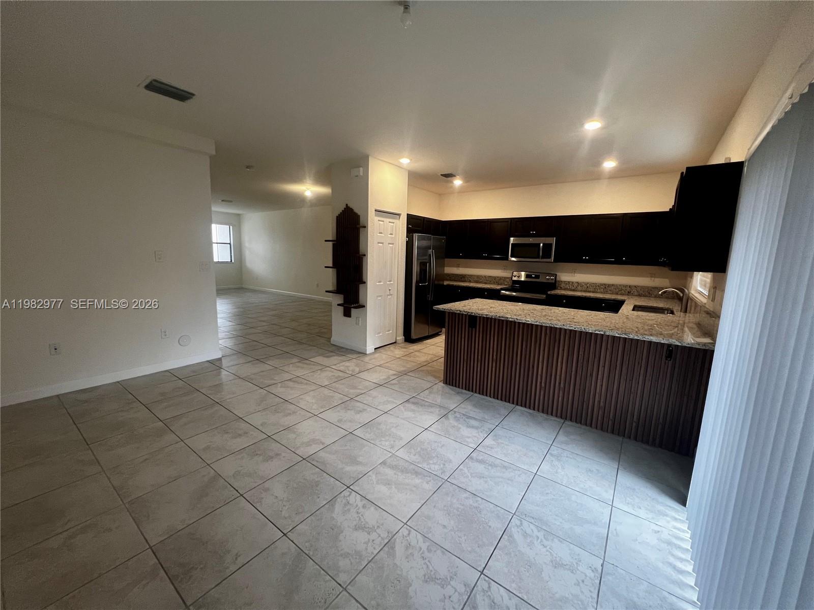 11989 Southwest 150th Place Miami, FL 33196 - Photo 7 of 33