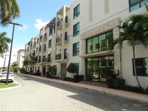 a view of a building with a street