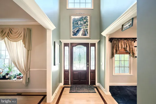 a view of a entryway door front of a house