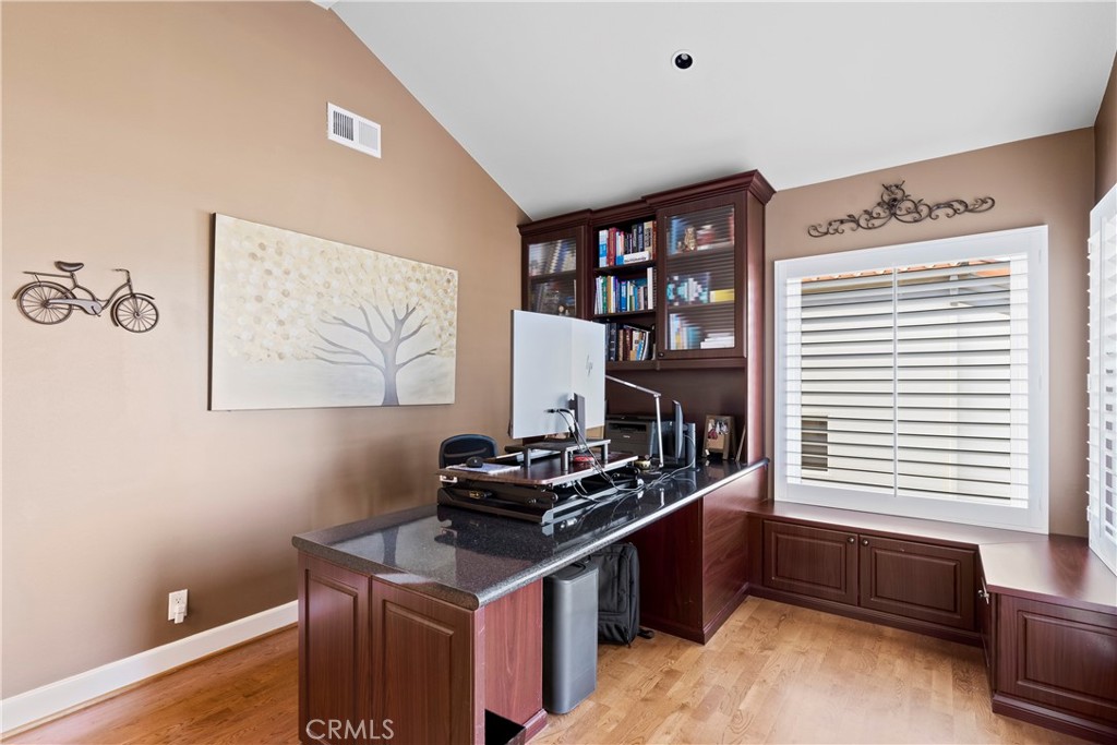 33662 Holtz Hill Drive Dana Point, CA 92629 - Photo 15 of 75 a kitchen with stainless steel appliances granite countertop a stove and a refrigerator
