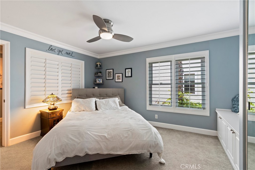 33662 Holtz Hill Drive Dana Point, CA 92629 - Photo 44 of 75 a bedroom with a large bed and a large window