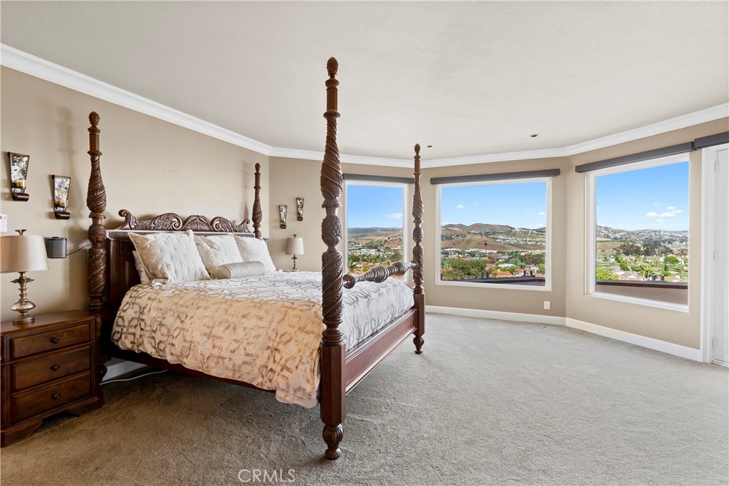 33662 Holtz Hill Drive Dana Point, CA 92629 - Photo 48 of 75 a bed room with a bed window and dresser