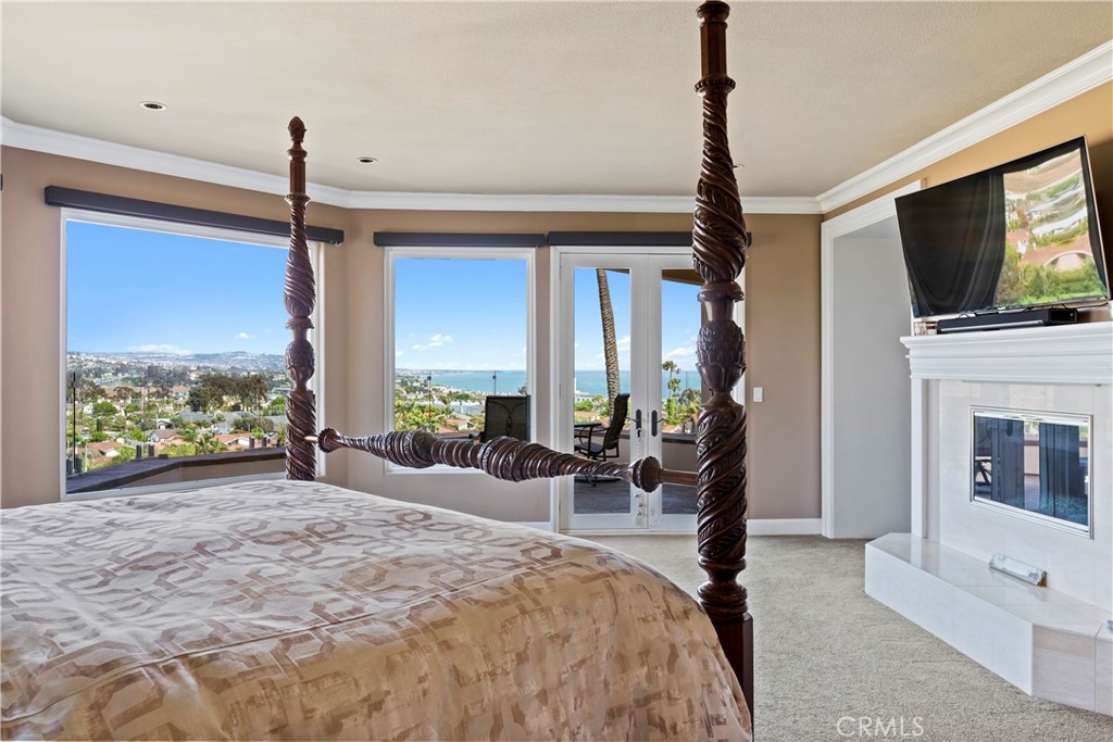 33662 Holtz Hill Drive Dana Point, CA 92629 - Photo 50 of 75 a view of a livingroom with furniture and floor to ceiling window