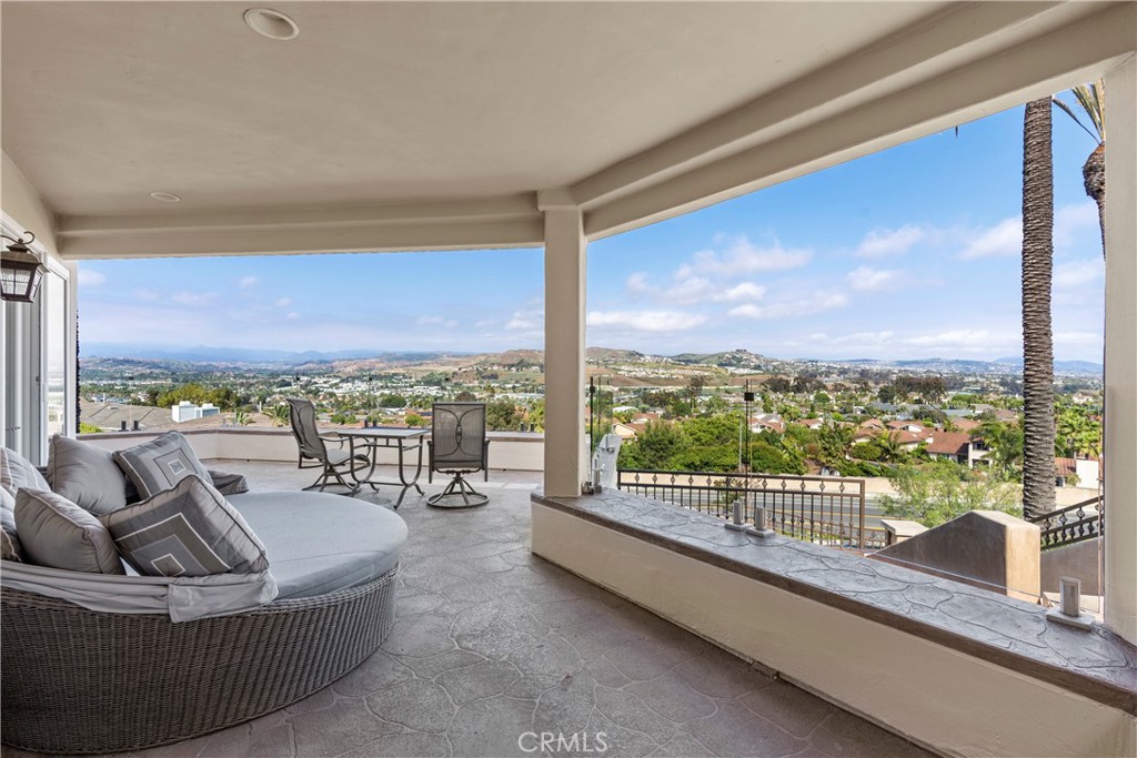 33662 Holtz Hill Drive Dana Point, CA 92629 - Photo 59 of 75 a living room with furniture and a floor to ceiling window