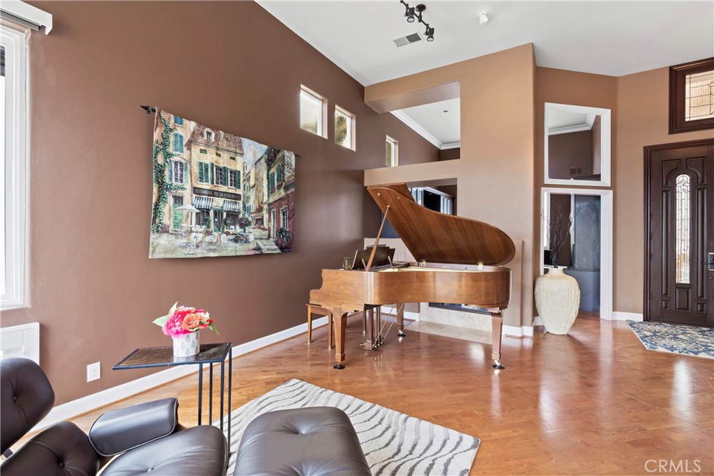33662 Holtz Hill Drive Dana Point, CA 92629 - Photo 9 of 75 a living room with furniture and wooden floor