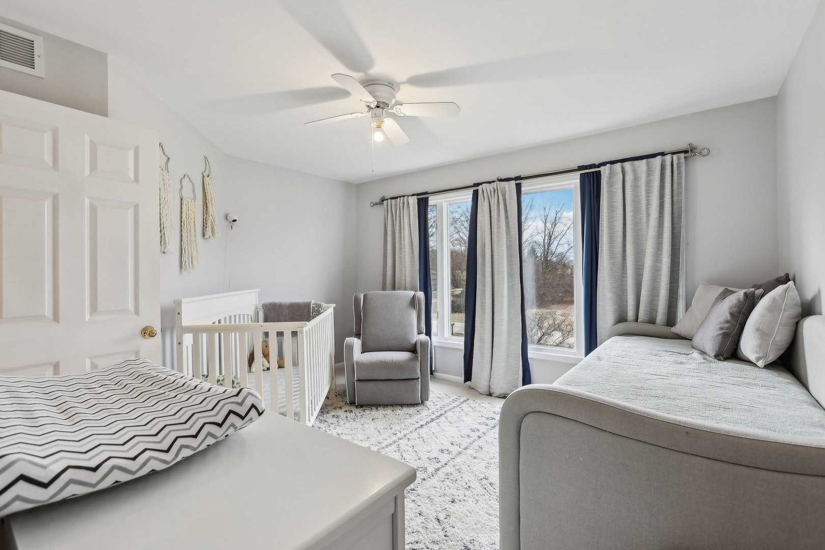 40783 Gridley Drive Antioch, IL 60002 - Photo 17 of 44 a bedroom with a bed couch and large window
