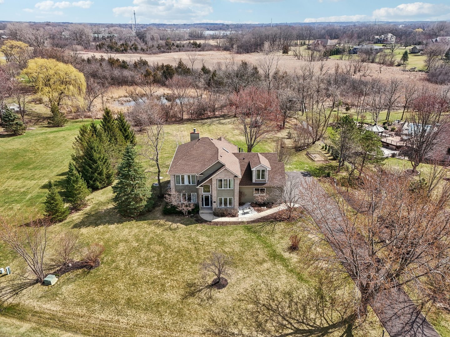 40783 Gridley Drive Antioch, IL 60002 - Photo 39 of 44 an aerial view of a house with a yard basket ball court and outdoor seating
