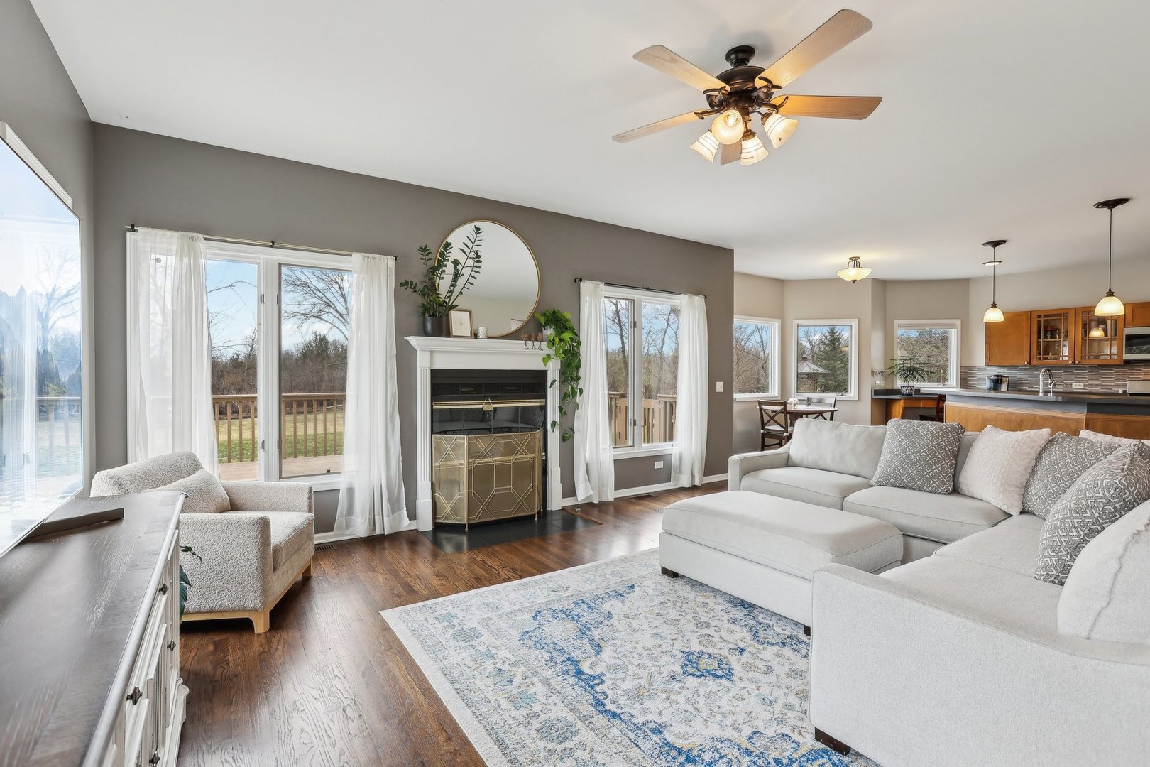 40783 Gridley Drive Antioch, IL 60002 - Photo 4 of 44 a living room with furniture fireplace and a large window