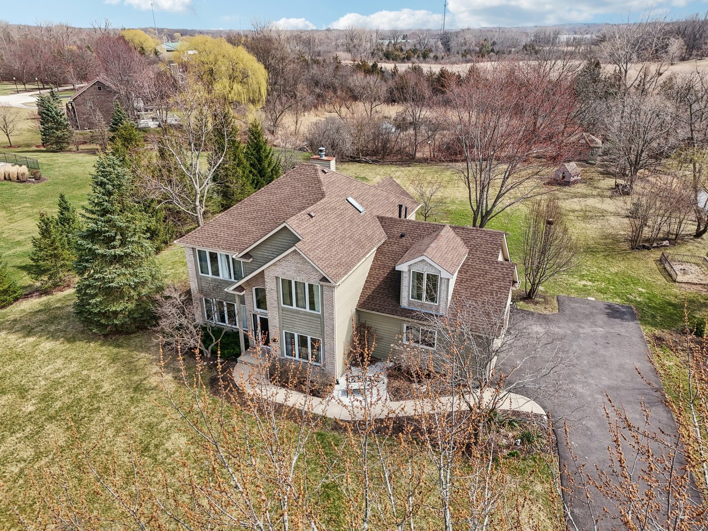 40783 Gridley Drive Antioch, IL 60002 - Photo 41 of 44 an aerial view of a house with yard and green space