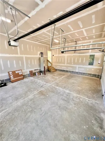 a view of a garage with wooden floor
