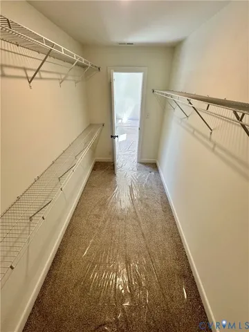 a view of a walk in closet