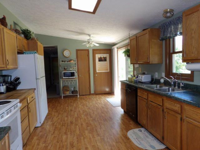 180 East Brogan Road Hastings, MI 49058 - Photo 6 of 40 180 E Brogan Kitchen 1