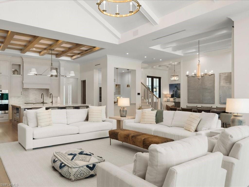 142 Eugenia Drive Naples, FL 34108 - Photo 11 of 35 a living room with furniture and a large window