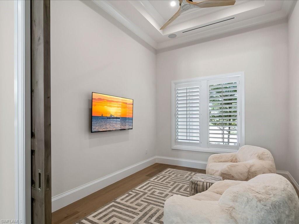 142 Eugenia Drive Naples, FL 34108 - Photo 20 of 35 a bedroom with furniture and a window