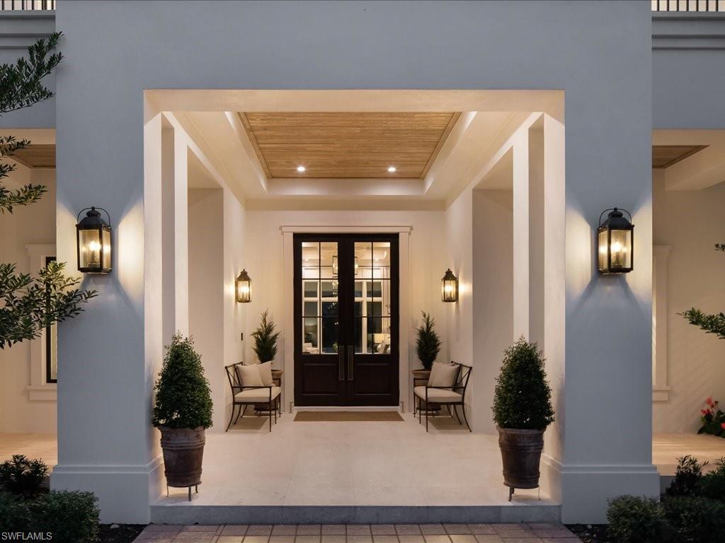 142 Eugenia Drive Naples, FL 34108 - Photo 3 of 35 a living room with furniture