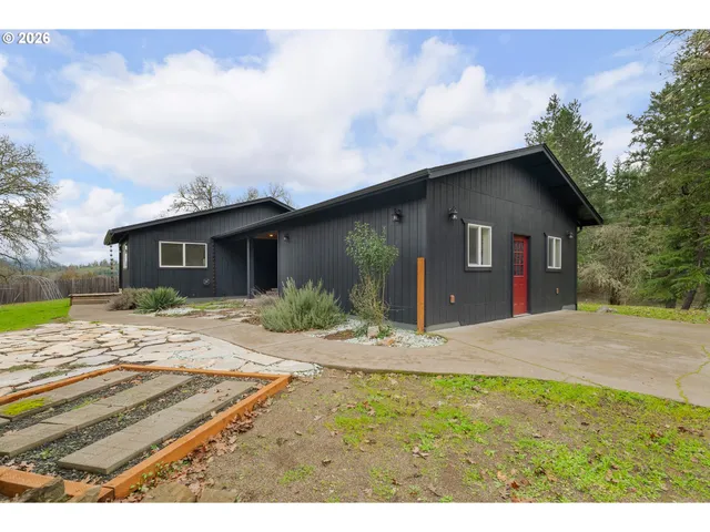 a view of a house with a patio