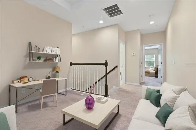 a bedroom with a large bed and a large window