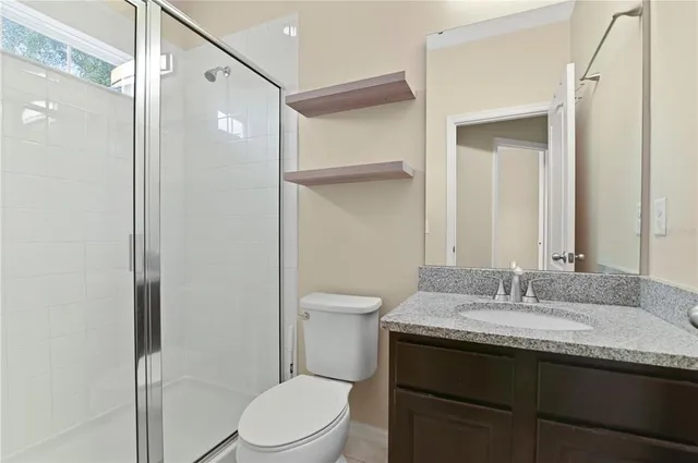 a view of a hallway with staircase