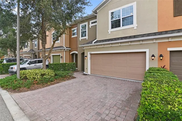 a bedroom with a bed and a television