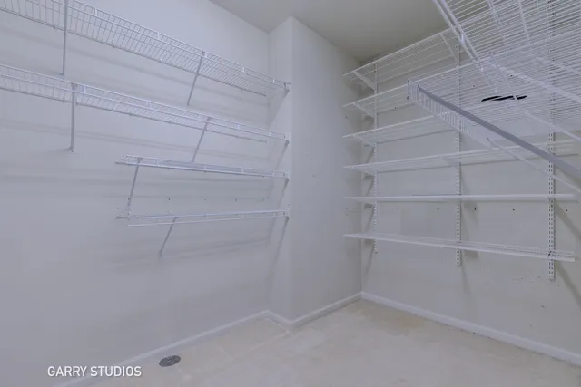 a view of a room with racks on the wall