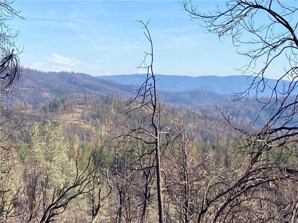 a view of a house with a mountain