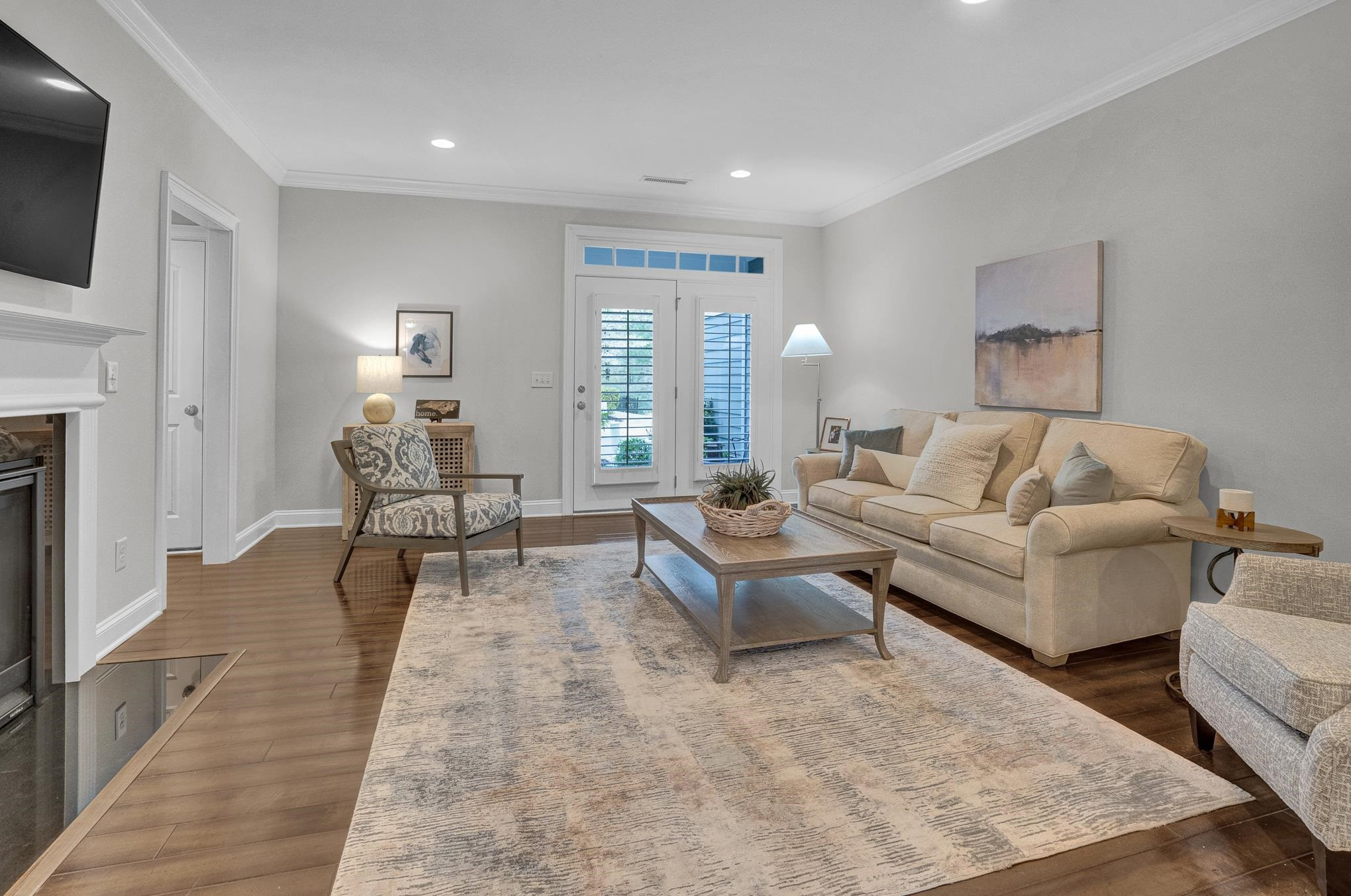 712 Fallon Grove Way Raleigh, NC 27608 - Photo 6 of 20 a living room with furniture and a fireplace