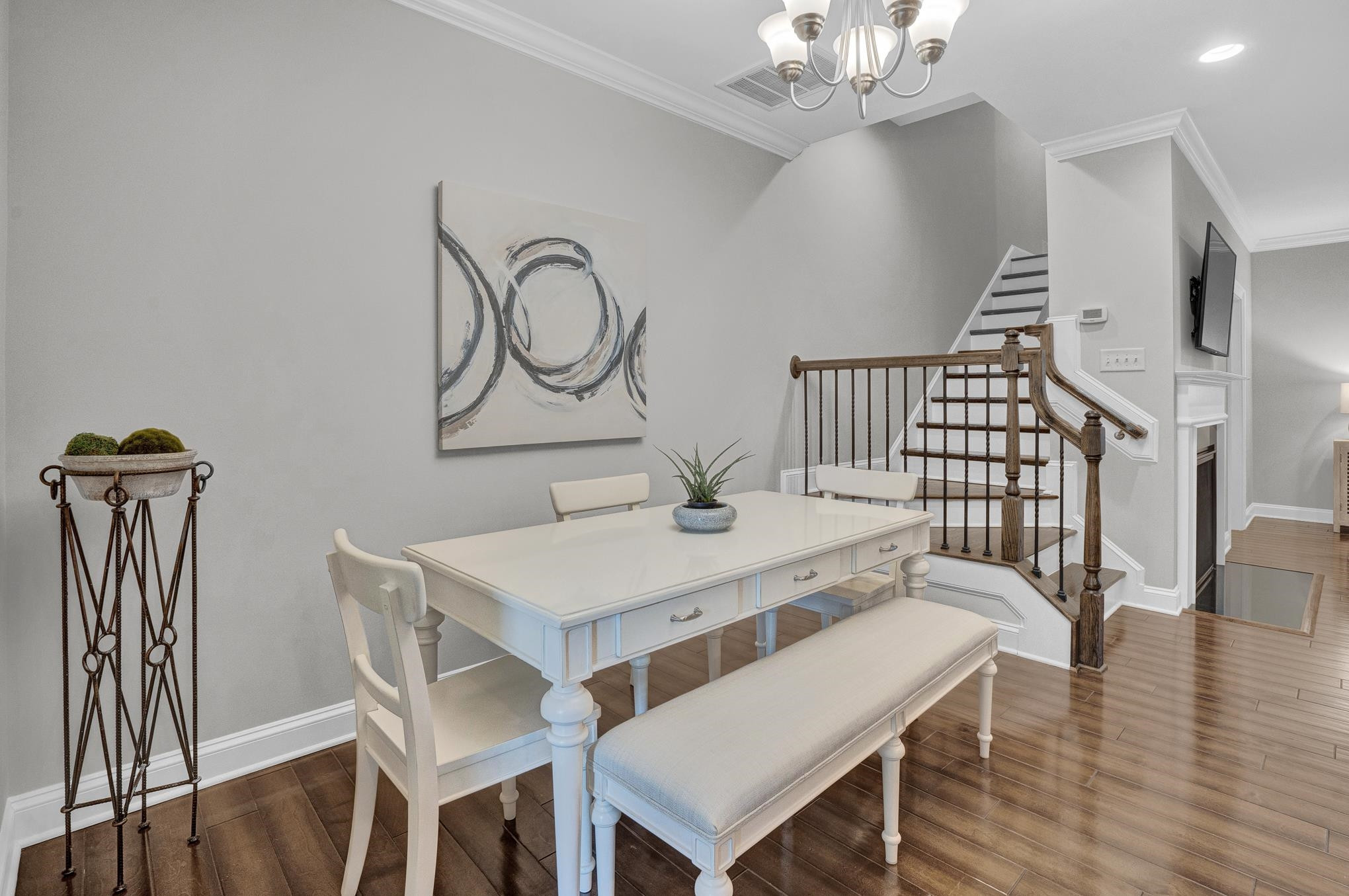 712 Fallon Grove Way Raleigh, NC 27608 - Photo 9 of 20 a view of a dining room with furniture and wooden floor