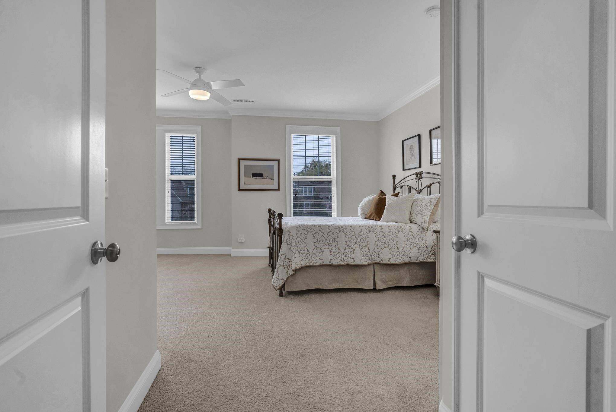 712 Fallon Grove Way Raleigh, NC 27608 - Photo 10 of 20 a bedroom with a bed and window