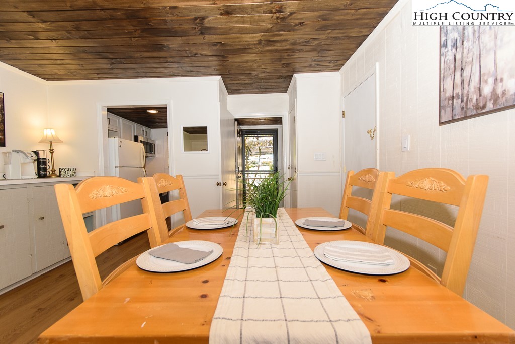 220 Northridge Road, Unit 25 Beech Mountain, NC 28604 - Photo 18 of 47 a living room with furniture and wooden floor