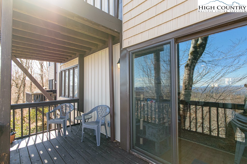 220 Northridge Road, Unit 25 Beech Mountain, NC 28604 - Photo 34 of 47 a view of a balcony with furniture