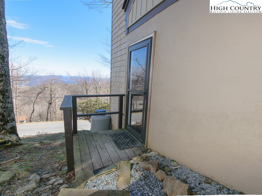 220 Northridge Road, Unit 25 Beech Mountain, NC 28604 - Photo 43 of 47 a view of a house with a yard