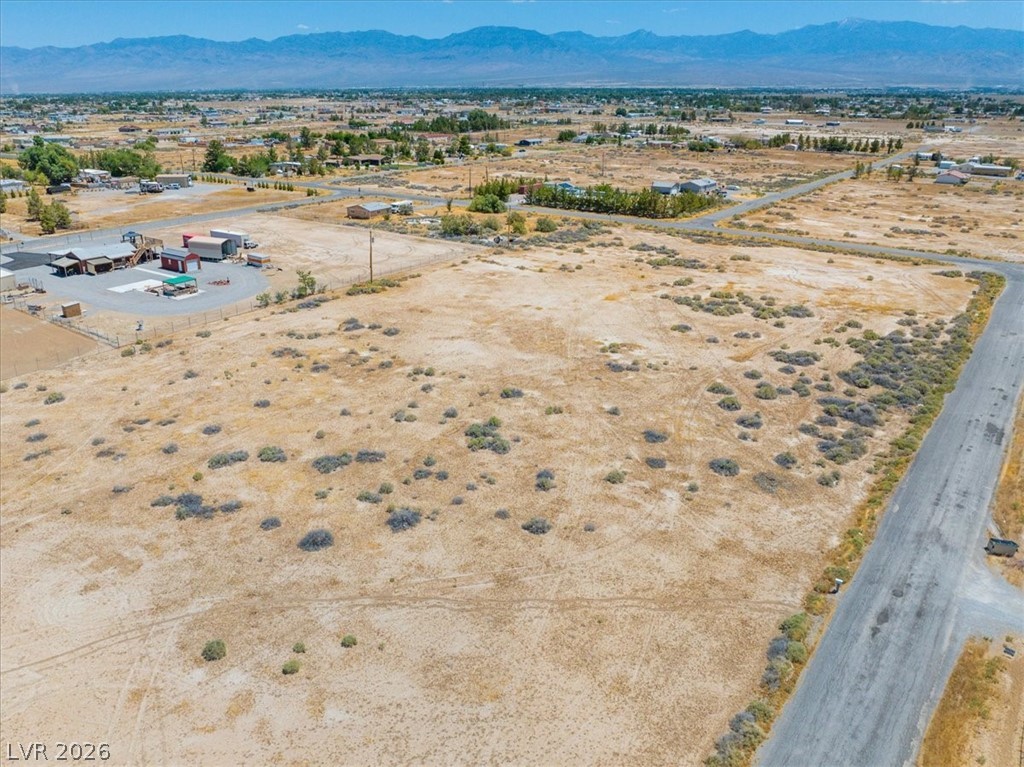 4580 Lawrence Road Pahrump, NV 89048 - Photo 29 of 40 A vast, undeveloped lot with distant mountain views, ready for your custom build.