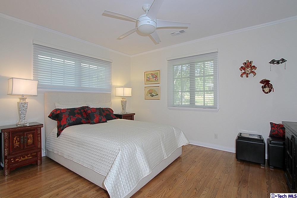 3690 Newhaven Road Pasadena, CA 91107 - Photo 17 of 21 a bedroom with a bed and wooden floor